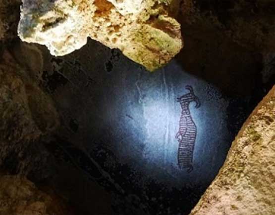 ภาพเขียนสีโบราณในถ้ำผีหัวโต จังหวัดกระบี่